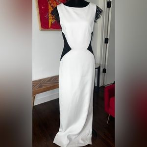 Beautiful formal gown with exquisite lace overlay inserts.